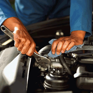 Mechanic working on car